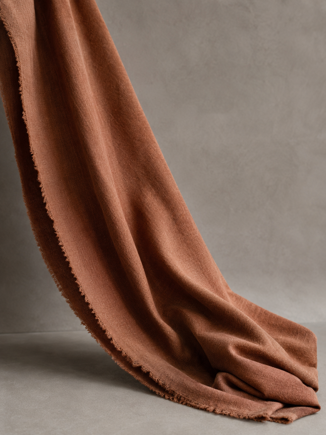 Clay brown linen-blend fabric swatch in natural light